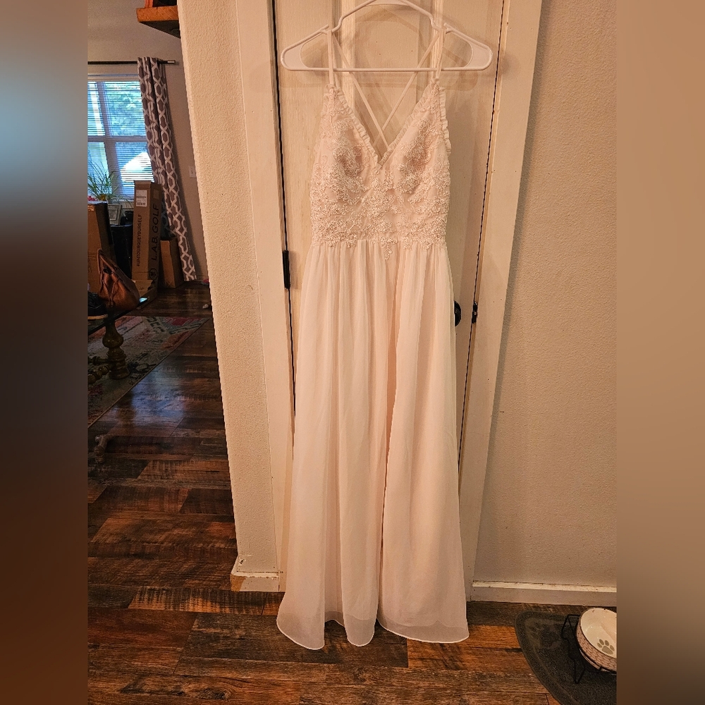 Azazie size small blush pink bridesmaid dress. Floral top with side slit